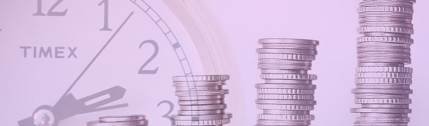 A watch and coins on a purple background.